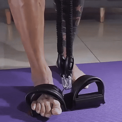 Gif Homme tatoué s'entraînant à domicile avec l'élastique de musculation FitHome  